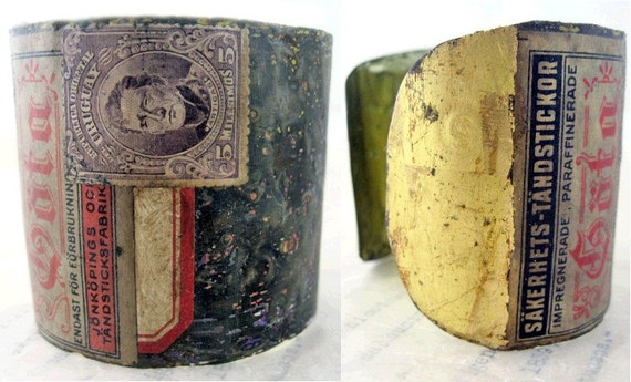 Melancholia. Recycled Rustic Tea Tin Cuff with Gold Leaf.