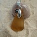 Drilled amber colored sea glass necklace