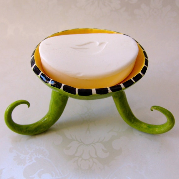 whimsical ceramic candy candle dish with curly legs