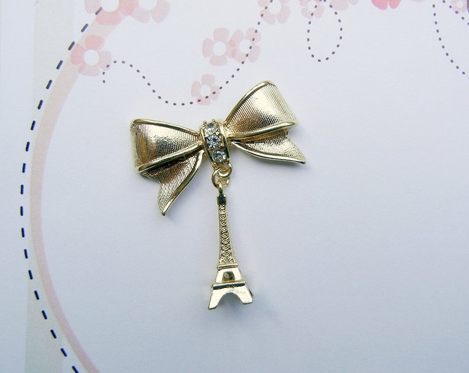 Gold-tone Bow and Eiffel Tower Pendant Rhinestones