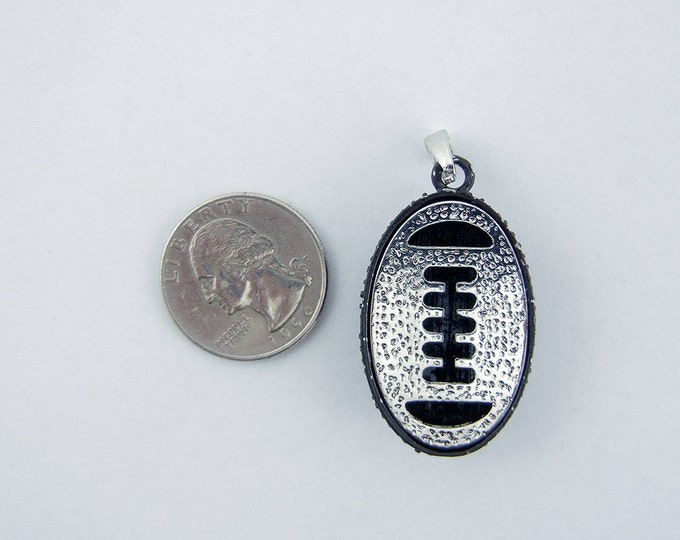 Black and White Epoxy Topaz Rhinestone Football Pendant SIlver-tone Base