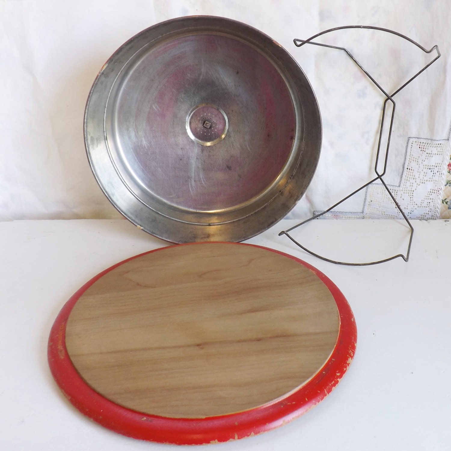 Vintage metal cake carrier with flowers and lady gardening