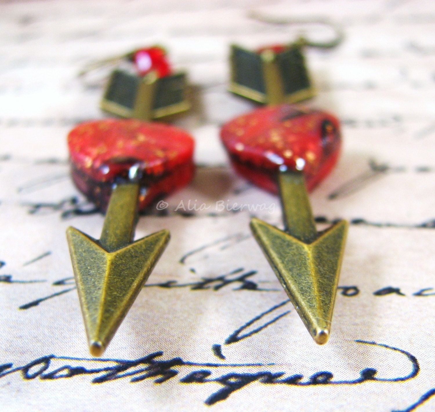 Lovestruck. Heart and arrow earrings. Polymer clay and