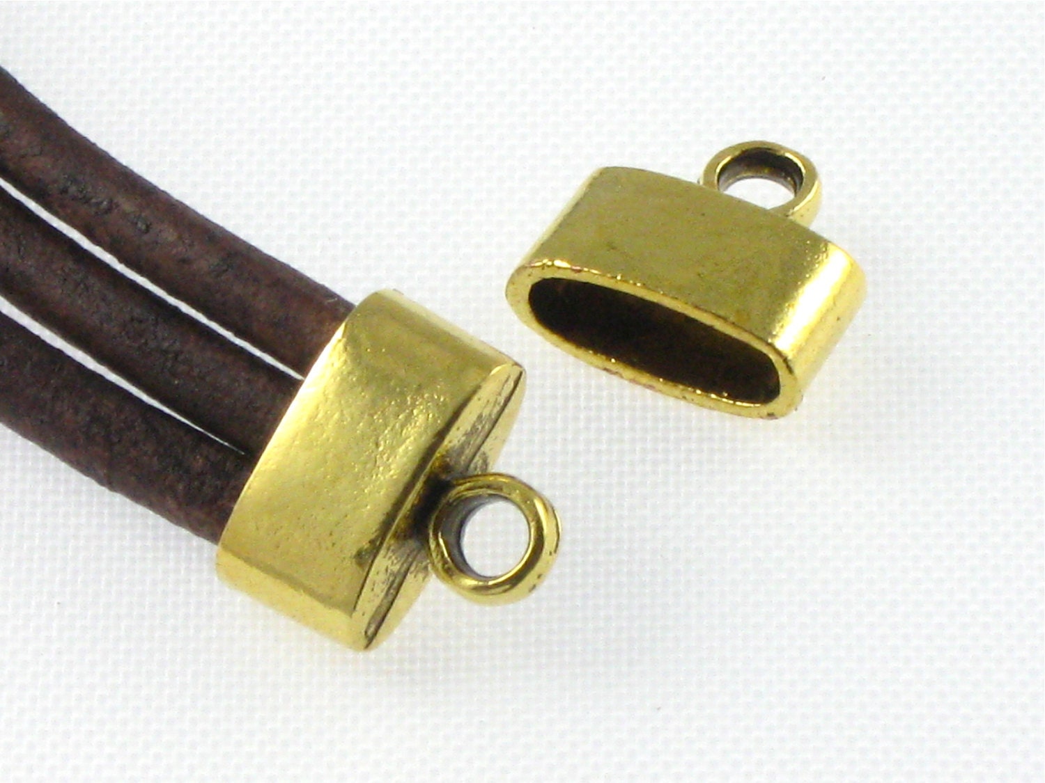 12 cord jewelry END CAPS in Gold tone . Large and Oval . 9mm x