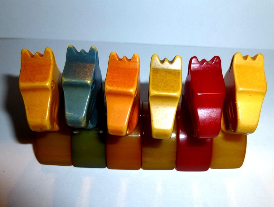 Rare Bakelite Horse Head Game Pieces. Five Carved Horses.