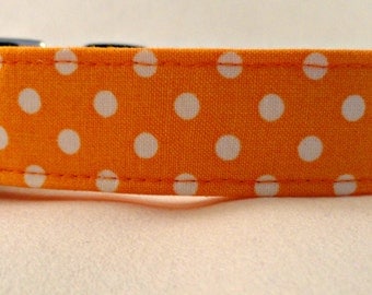 Eyecatching White Polka Dots on Bright Orange Dog Collar