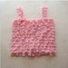 Pink ruffle top, infant and toddler sizes available.