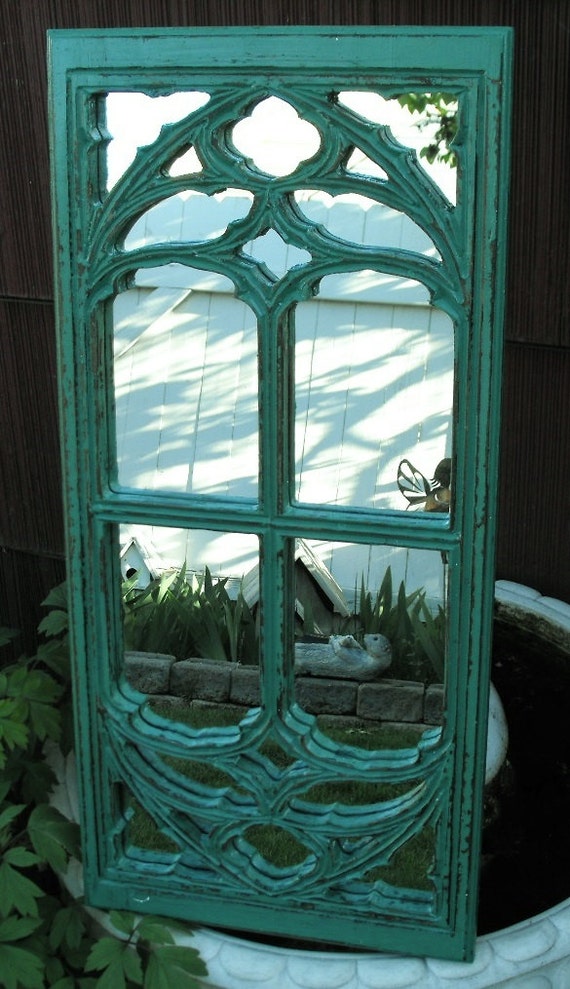 Window Frame Mirror Teal in color