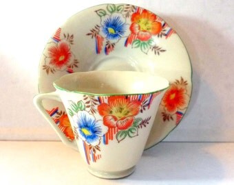 SALE Vintage Orange and Blue Flower Handpainted Teacup and Saucer