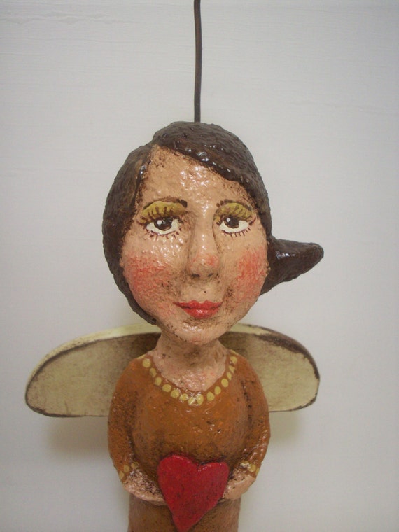 folk art angel figurine