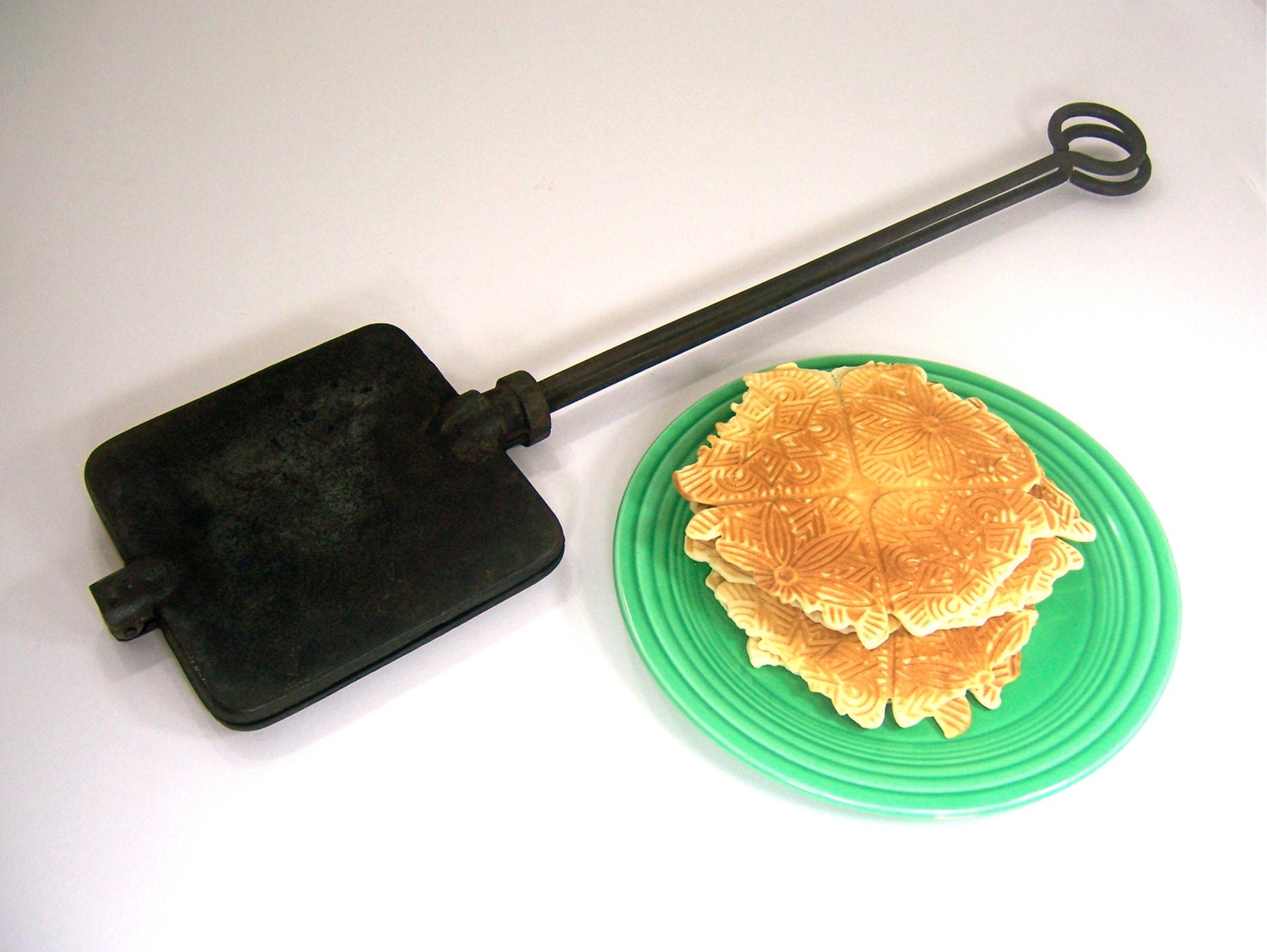 Antique cast iron pizzelle iron maker of oldfashioned