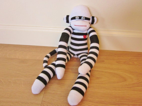 red and white striped sock monkey