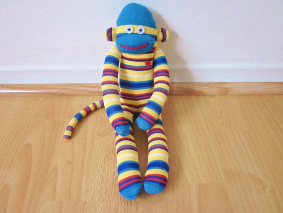 red and white striped sock monkey