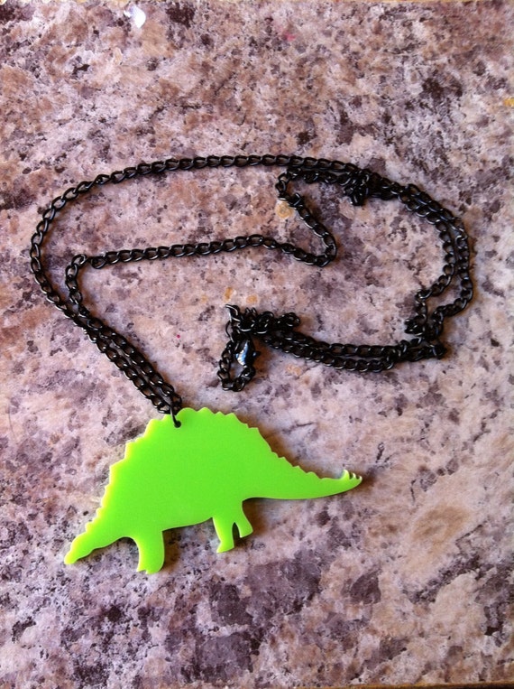 Dinosaur necklace by PoeticThread on Etsy