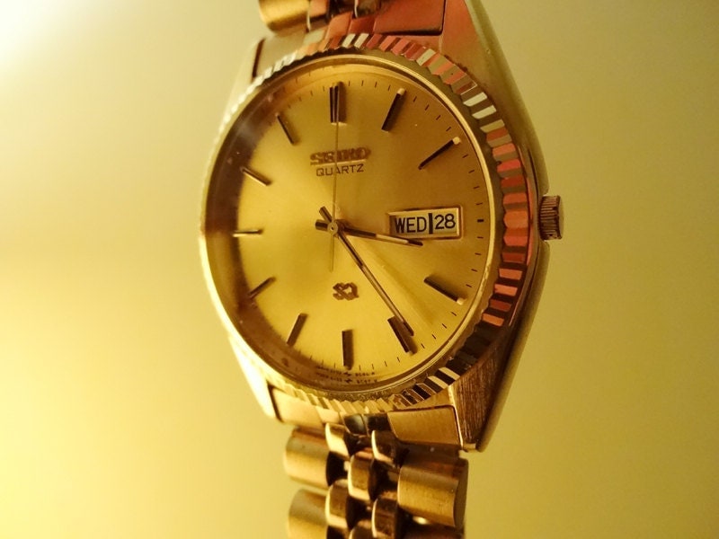 vintage-gold-seiko-mens-watch-sq-quartz-day-by-antiqueapartment