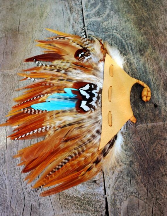 Turquoise Feather Ear Cuff by WildPeopleFreeSpirit on Etsy