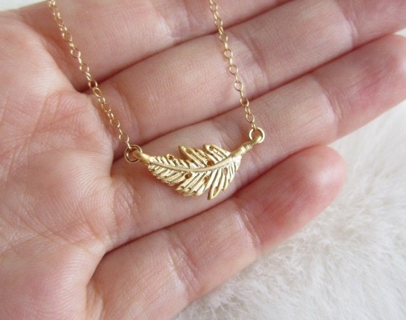 Tiny Gold Feather Necklace feather necklace sideways