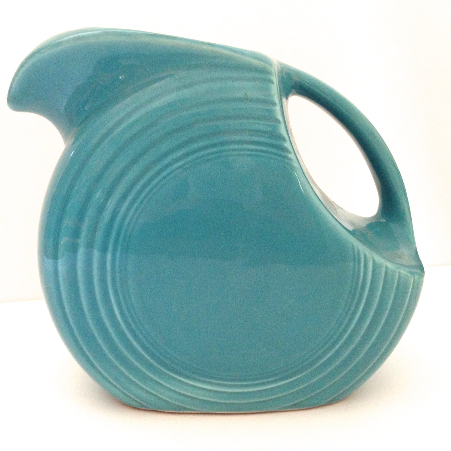 Vintage Fiesta disk pitcher in original turquoise by JanvierRoad