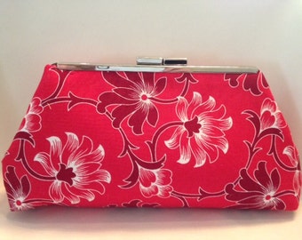 red and white clutch bag