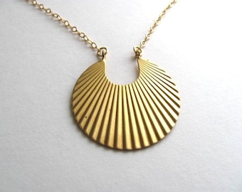 Egyptian sunburst pendant necklace, vintage gold tone round pendant on 14k gold plate chain
