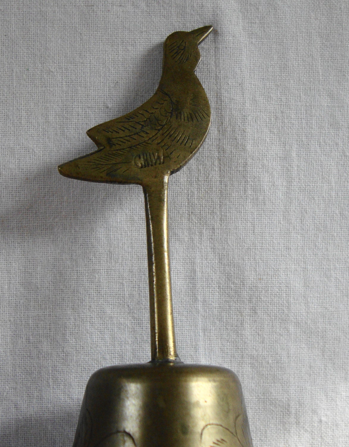 brass bird bell