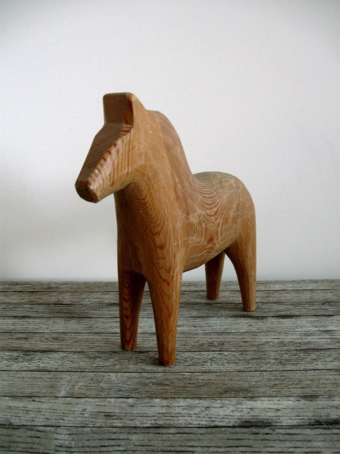 beautiful simple unpainted carved dala horse wooden swedish