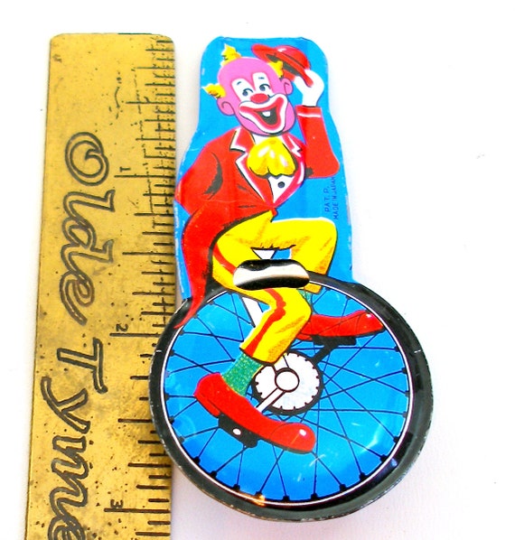 60s Circus Clown whistle Japanese tin toy figure on unicycle