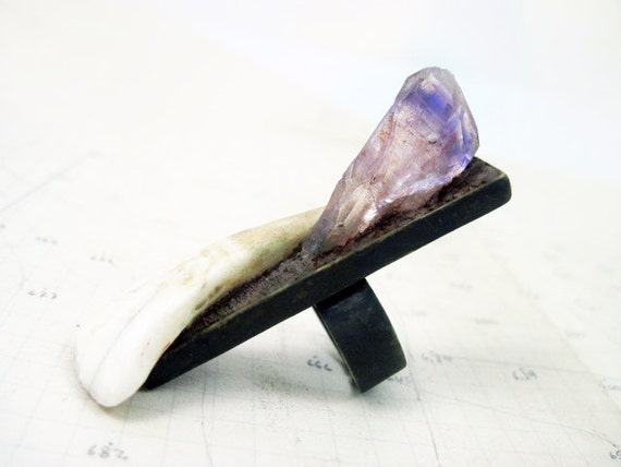 The Cave of Night. Rough, raw amethyst chunk and Buffalo tooth in rectangular ring. Primitive, modern.