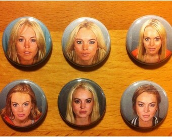 lindsay lohan mugshot refrigerator magnets. complete set of six. with extra special bonus.