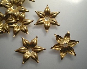 12 brass mirror rosettes, No. 11