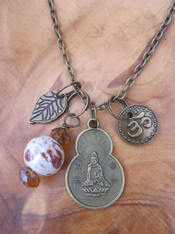 Items similar to Buddha QuanYin Coin Charm Necklace Goddess of