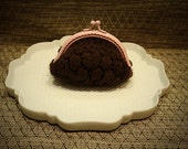 Brown and pink coin purse