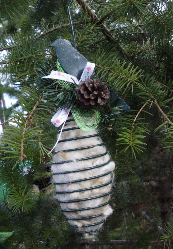 Bird nesting material. All natural in a reusable container.