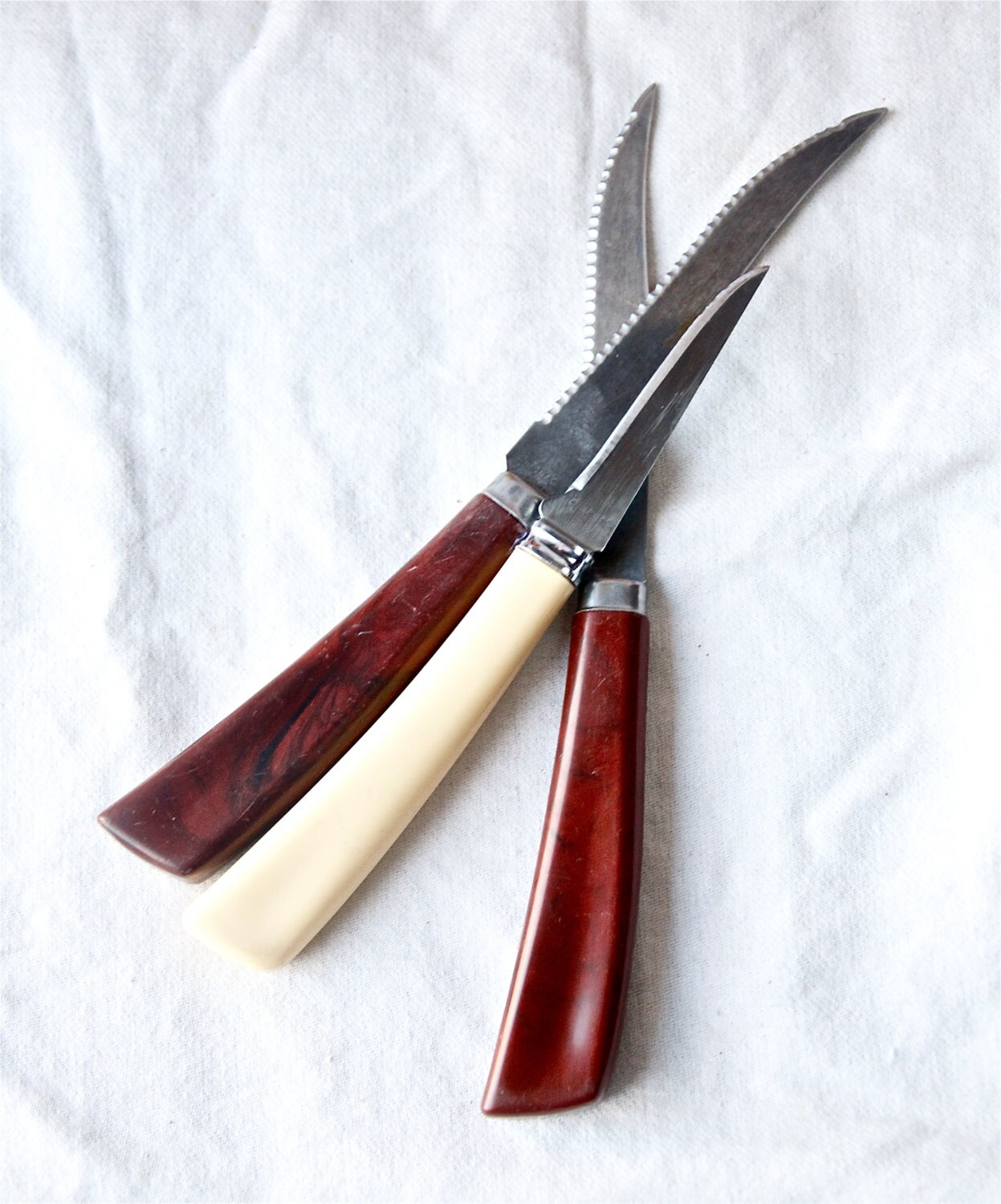 3 vintage Quikut knives...two steak knives...one paring knife.