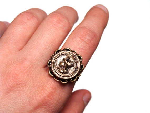 stamped brass portrait button from Victorian era made into jewelry cocktail ring