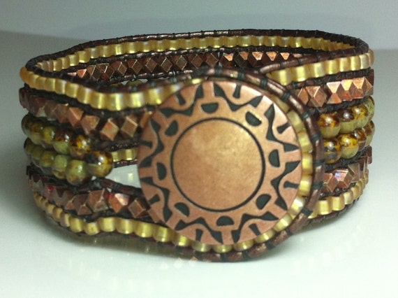 Copper metallic wide leather wrap cuff bracelet.  Wide cuff in earthy green, gold and copper.