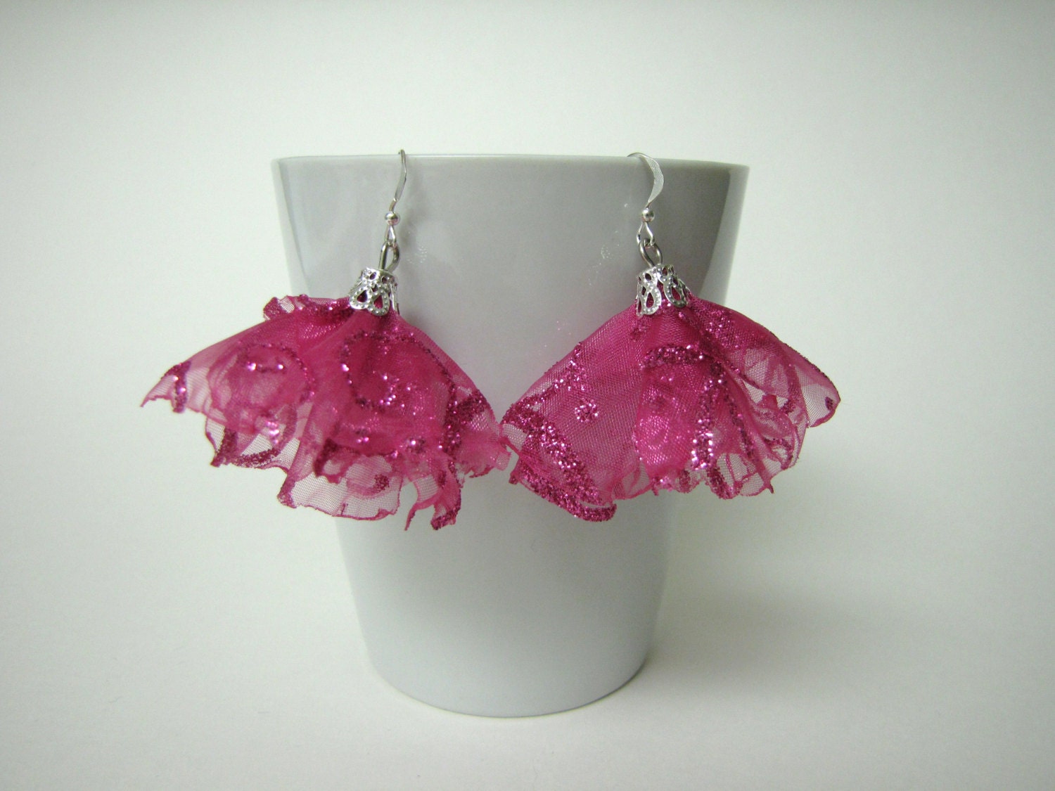 Bright pink fabric flower earrings glittered swirl