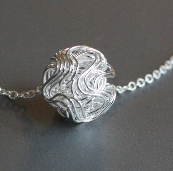 Items similar to Wire Ball necklace, rose gold wire wrapped ball on a