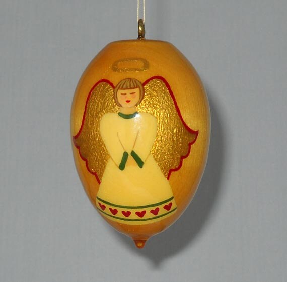 christmas ornament large folk art angel dressed in ivory christmas ornament large folk art angel dressed in ivory