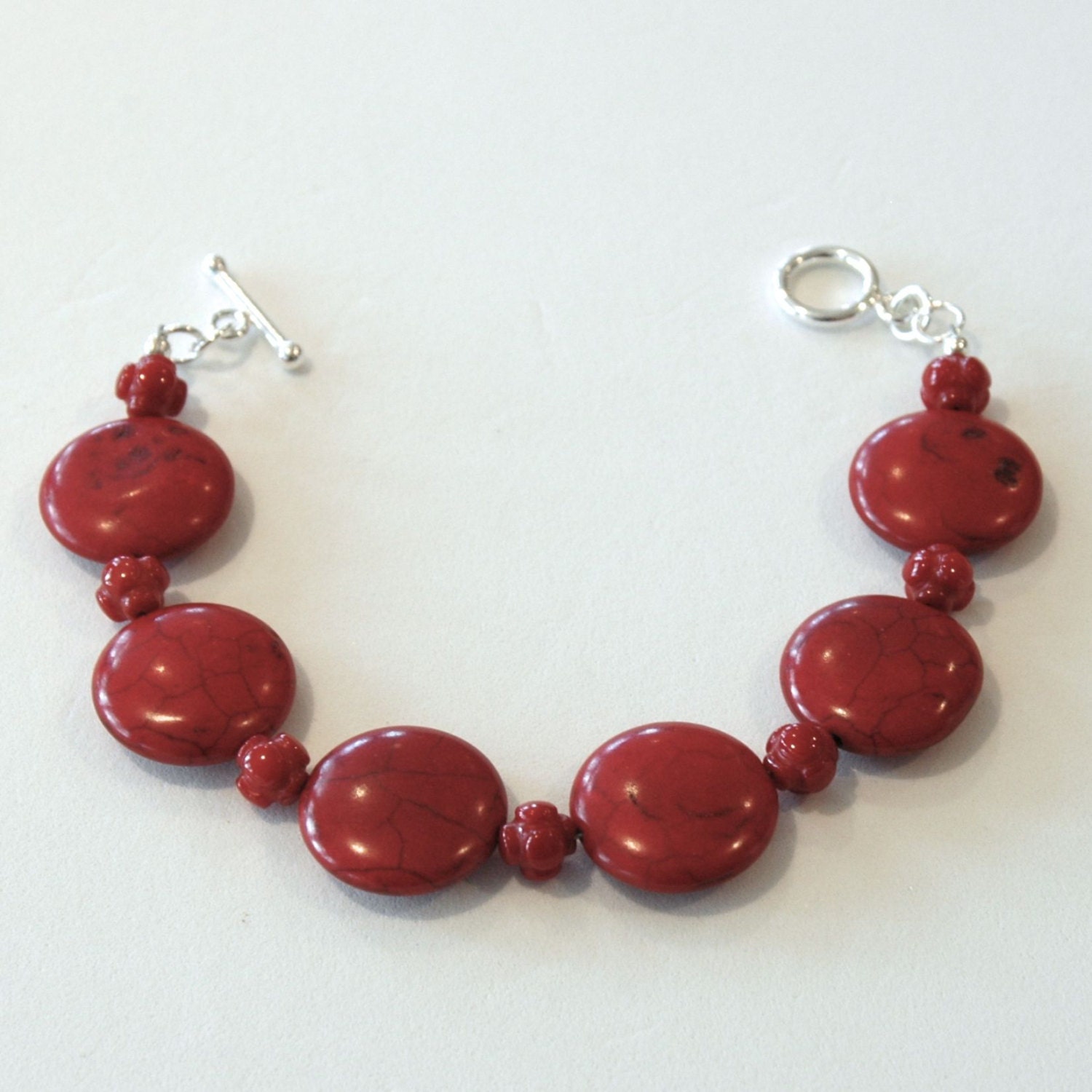 Bracelet with red flat round stones red bracelet red oval