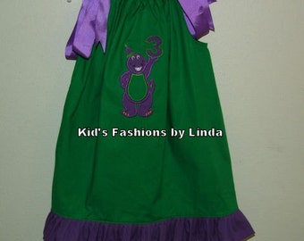 Green Pillowcase Dress with Purple Ruffle and Barney Applique