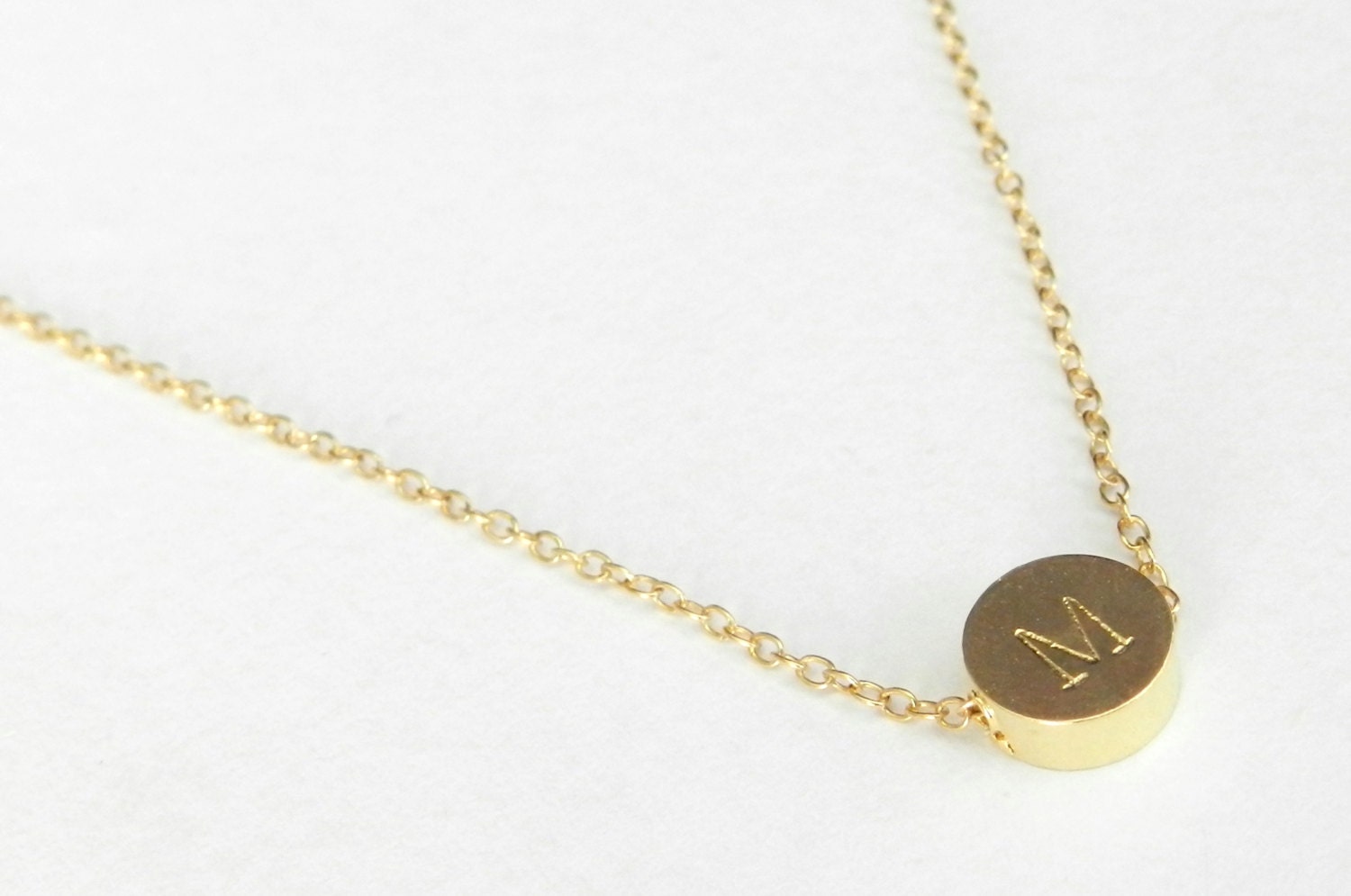 Gold sequin initial necklace