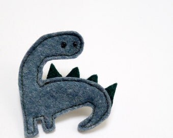 dinosaur brooch