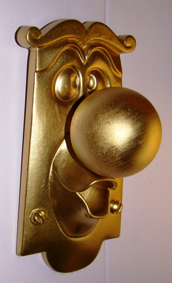 https://www.etsy.com/au/listing/130124511/alice-in-wonderland-doorknob-character