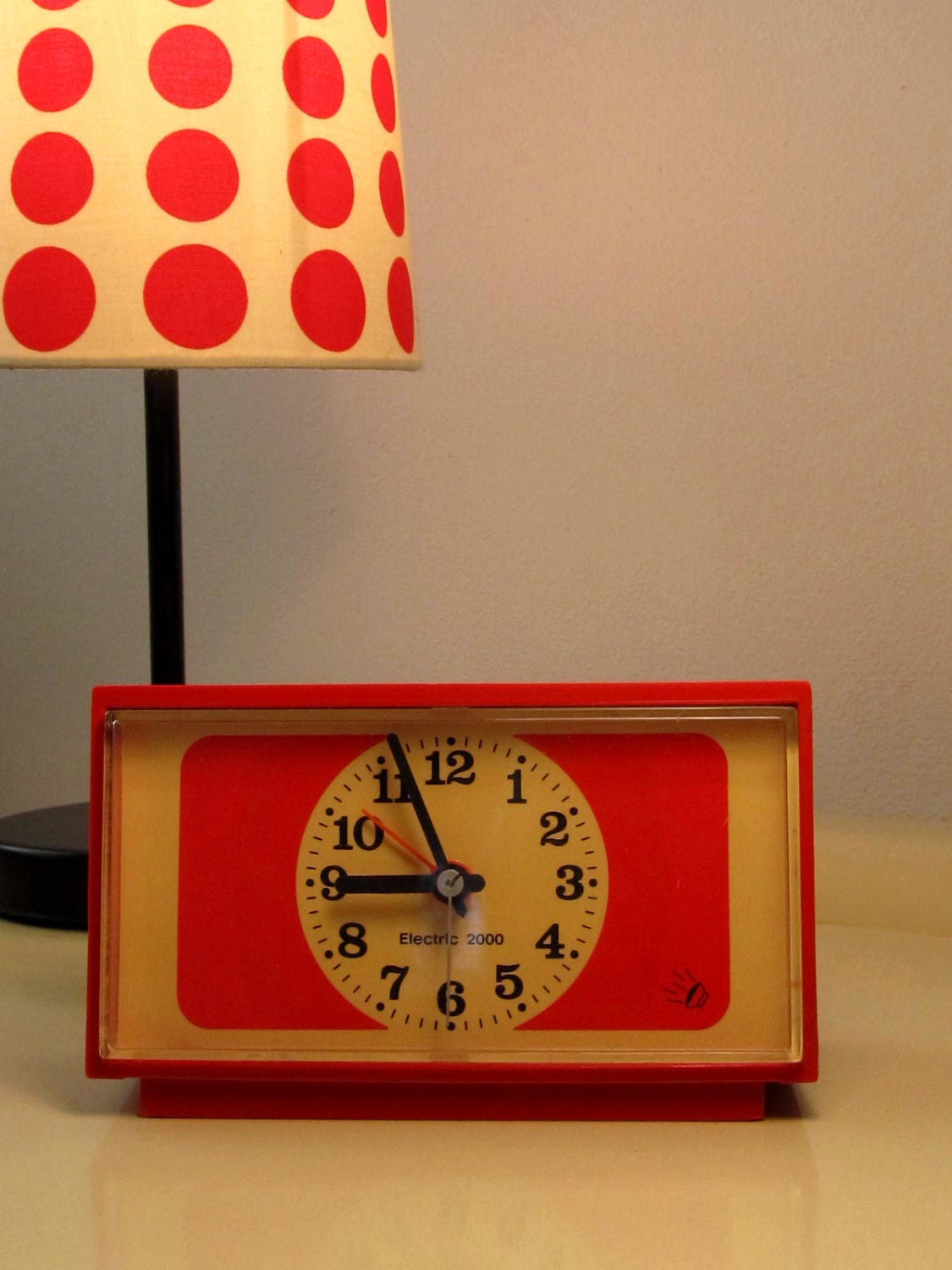 Vintage Electric Alarm Clock in red/orange color made in the