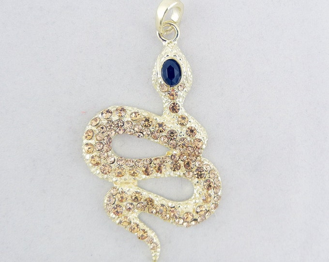 Gold tone Snake Pendant with Topaz Rhinestones Black Eye Accent