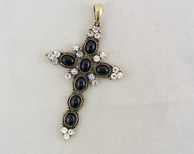 Black Acrylic Oval Cabochon Decorated Gold-tone Cross Rhinestone Accents