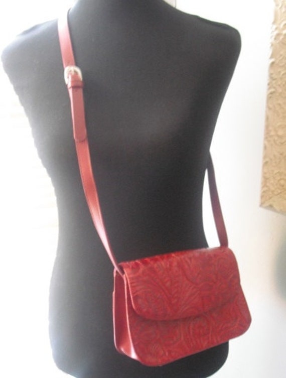 red tooled leather purse