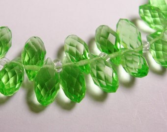 Faceted teardrop crystal briolette beads - 24 pcs - 12mm by 6mm - top sideways drill - peridot green