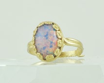 Popular items for glass fire opal ring on Etsy